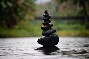 rocks balanced in a pile to illustrate the importance of support in mental resilience