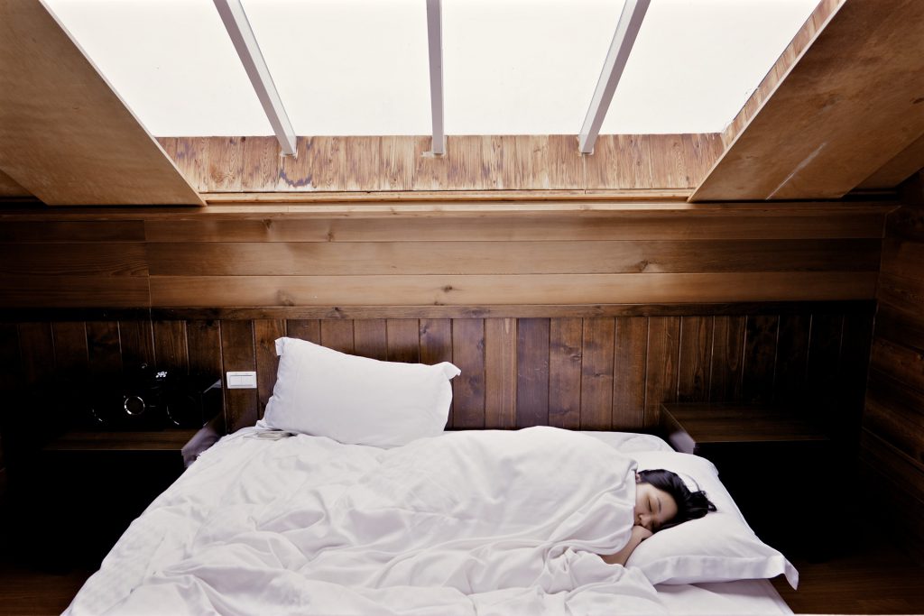 image of person in bed having had no sleep for a blog by Wellspace on poor mental health at work 