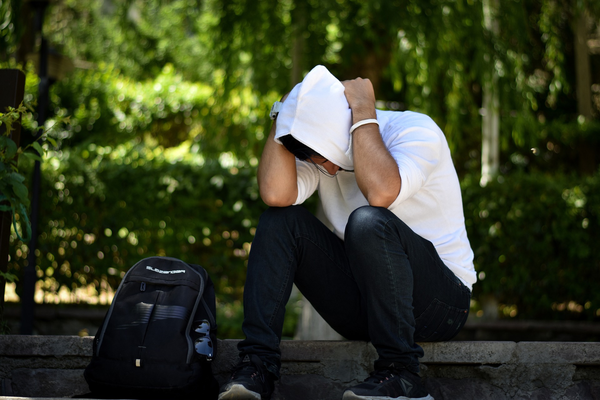 man looking depressed for workplace health and wellbeing blog