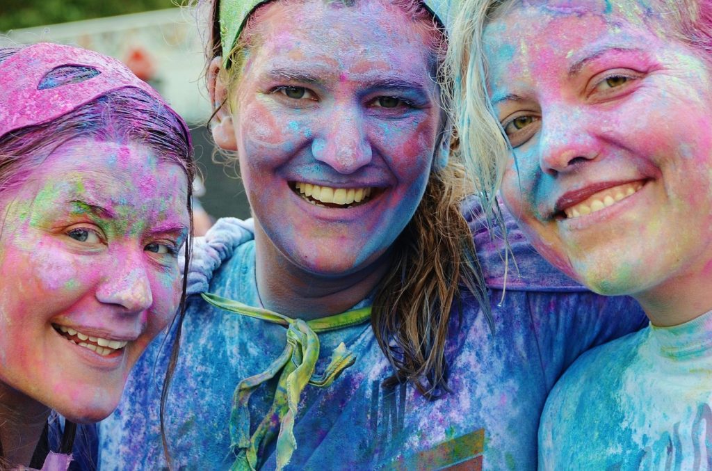 Charity events such as a colour run are good for building workplace relationships